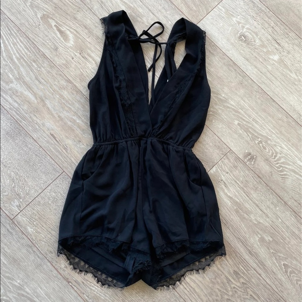 Lace romper with semi-plunging neckline!